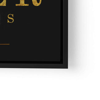 Motivationsbild mit goldener Schrift auf schwarzem Hintergrund im schwarzen Rahmen