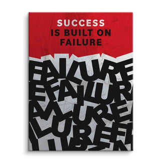 Motivationsbild auf Leinwand mit rotem Hintergrund und dem Text 'Success is built on failure'