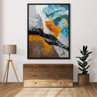 Abstraktes Wandbild mit bunten Akzenten in Orange, Blau und Schwarz über Kommode im modernen Wohnzimmer