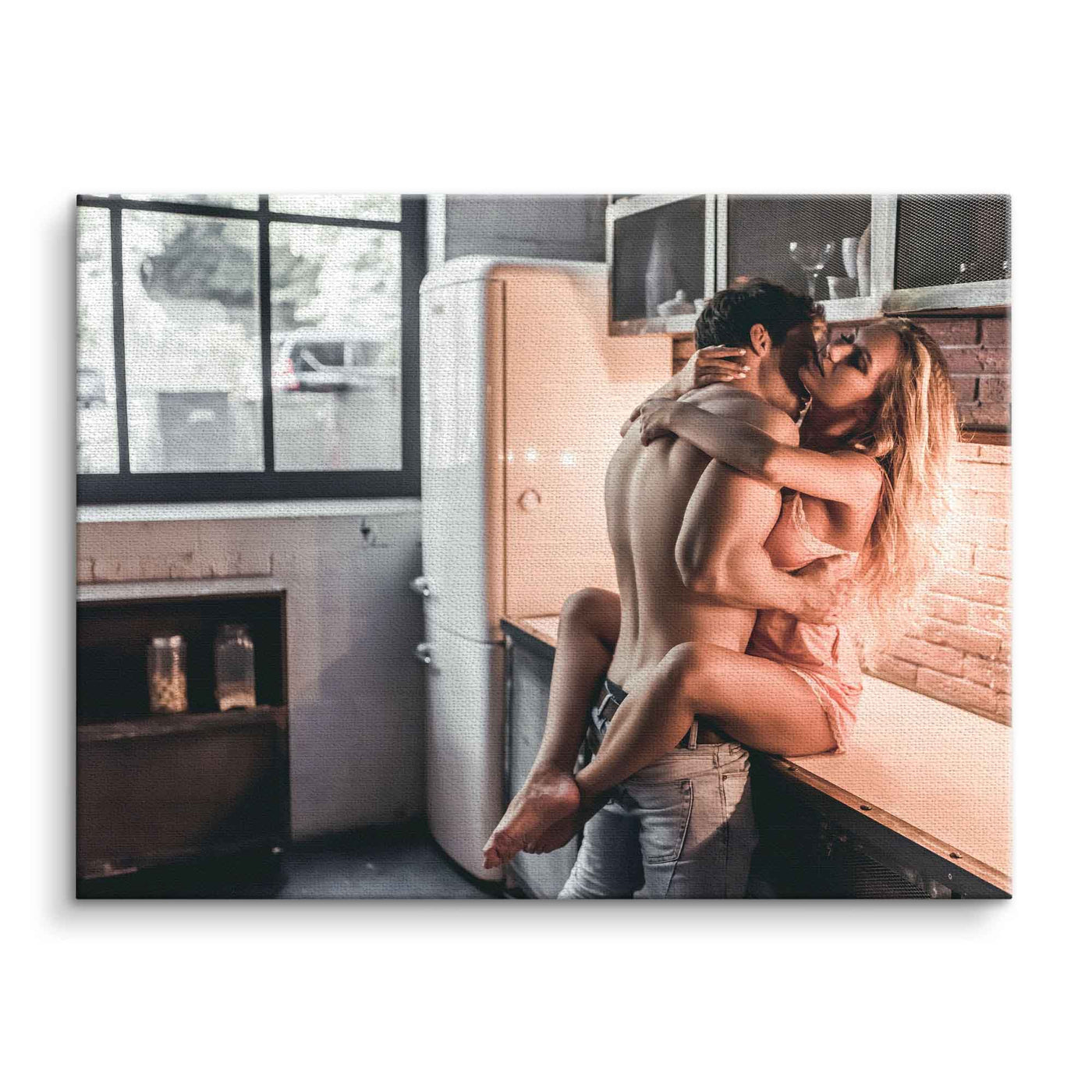 Sensual couple in the kitchen